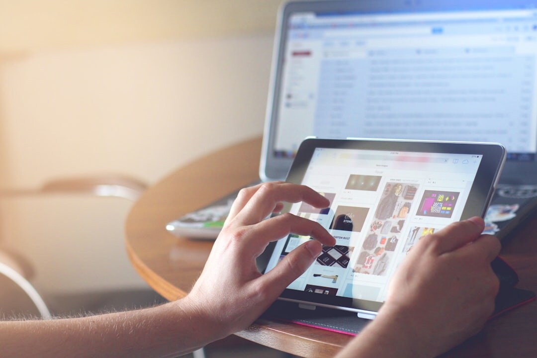 blogger writing post on laptop